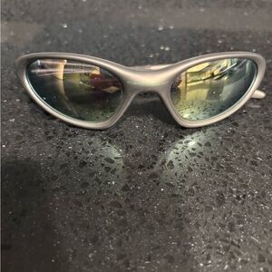 Vintage Oakley Minute Sunglasses in Gunmetal Grey with Green Mirrored Lenses.